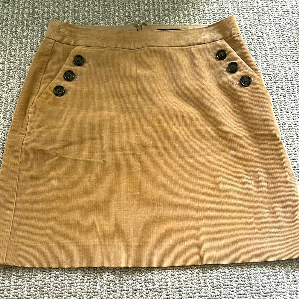 Corduroy mini skirt with button pockets